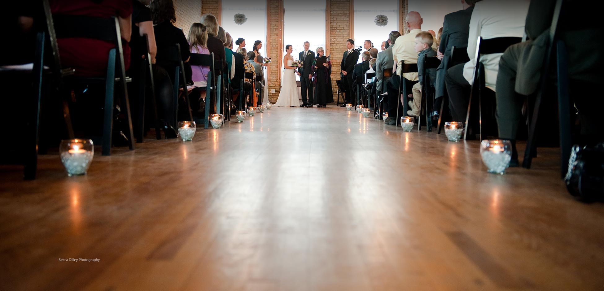 Day Block Event Center interior with exposed brick and high ceilings